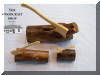 Huon pine logs and carved axes